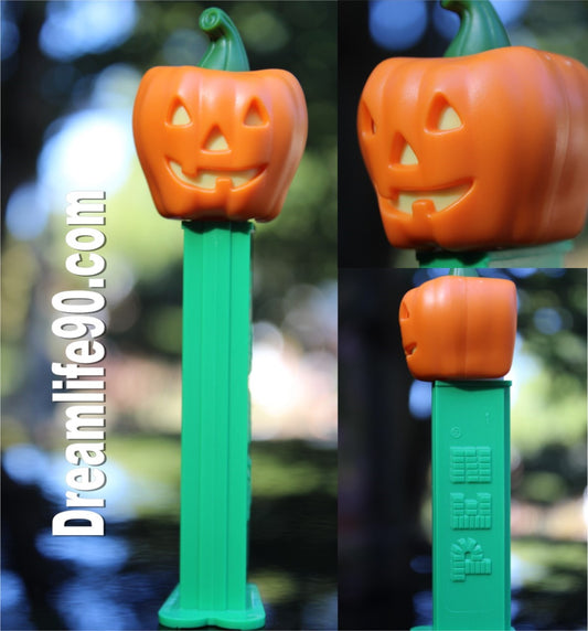Pumpkin Pez on Green Stem with Triangle Shaped Yellow Eyes and Nose, Loose