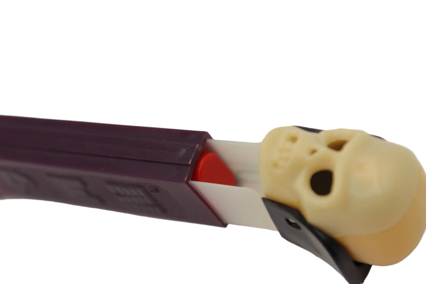 Dr Skull Pez, Skull A, Vampire Pez on Purple Stem, Thin Feet, Red Candy Pusher, Yugoslavia, Loose