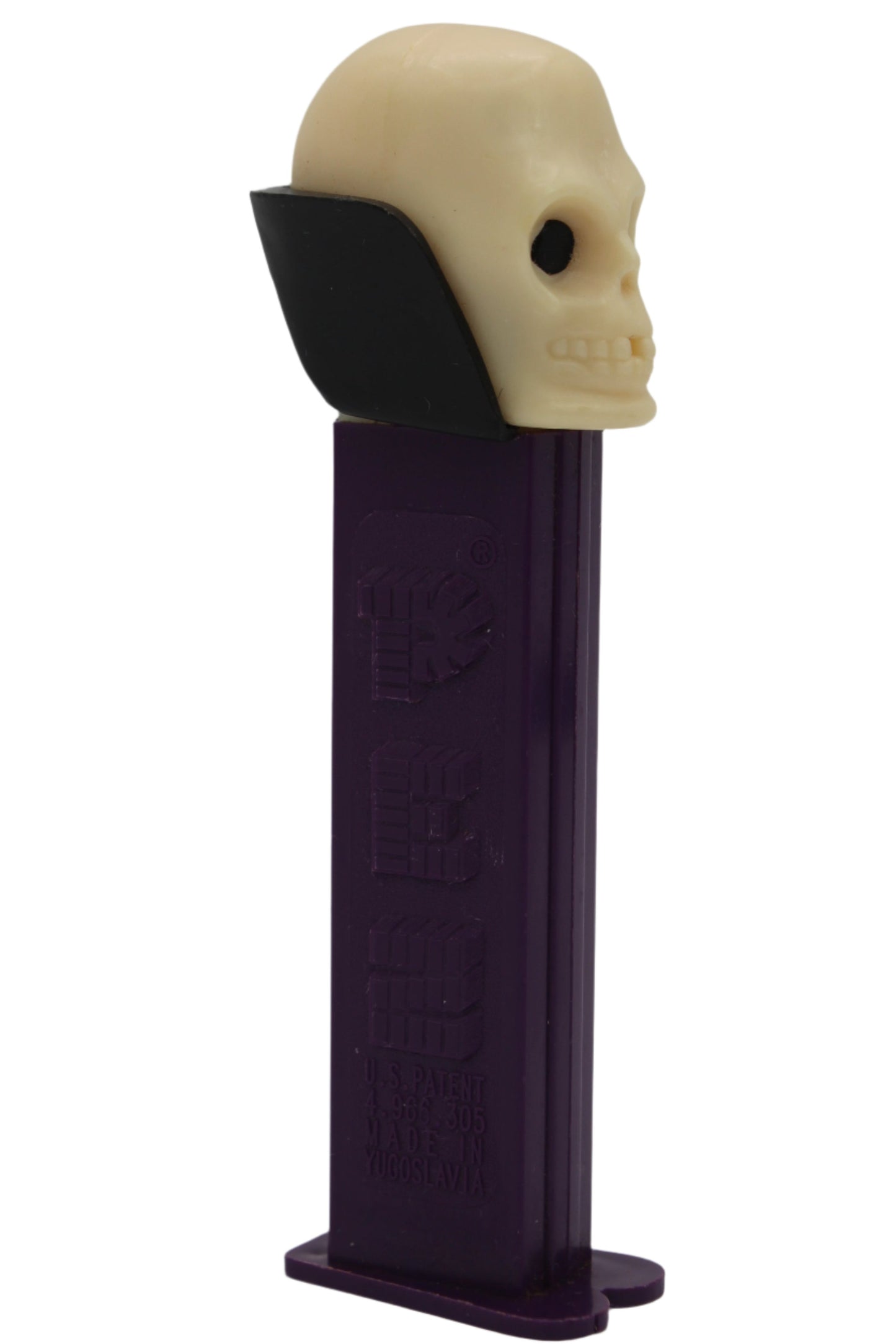 Dr Skull Pez, Skull B, Vampire Pez on Purple Stem, 2002, Yugoslavia, Loose