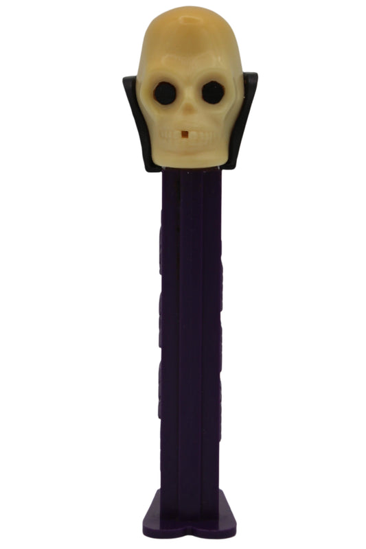 Dr Skull Pez, Skull B, Vampire Pez on Purple Stem, Yellowed Skull, 2002, Slovenia, Loose