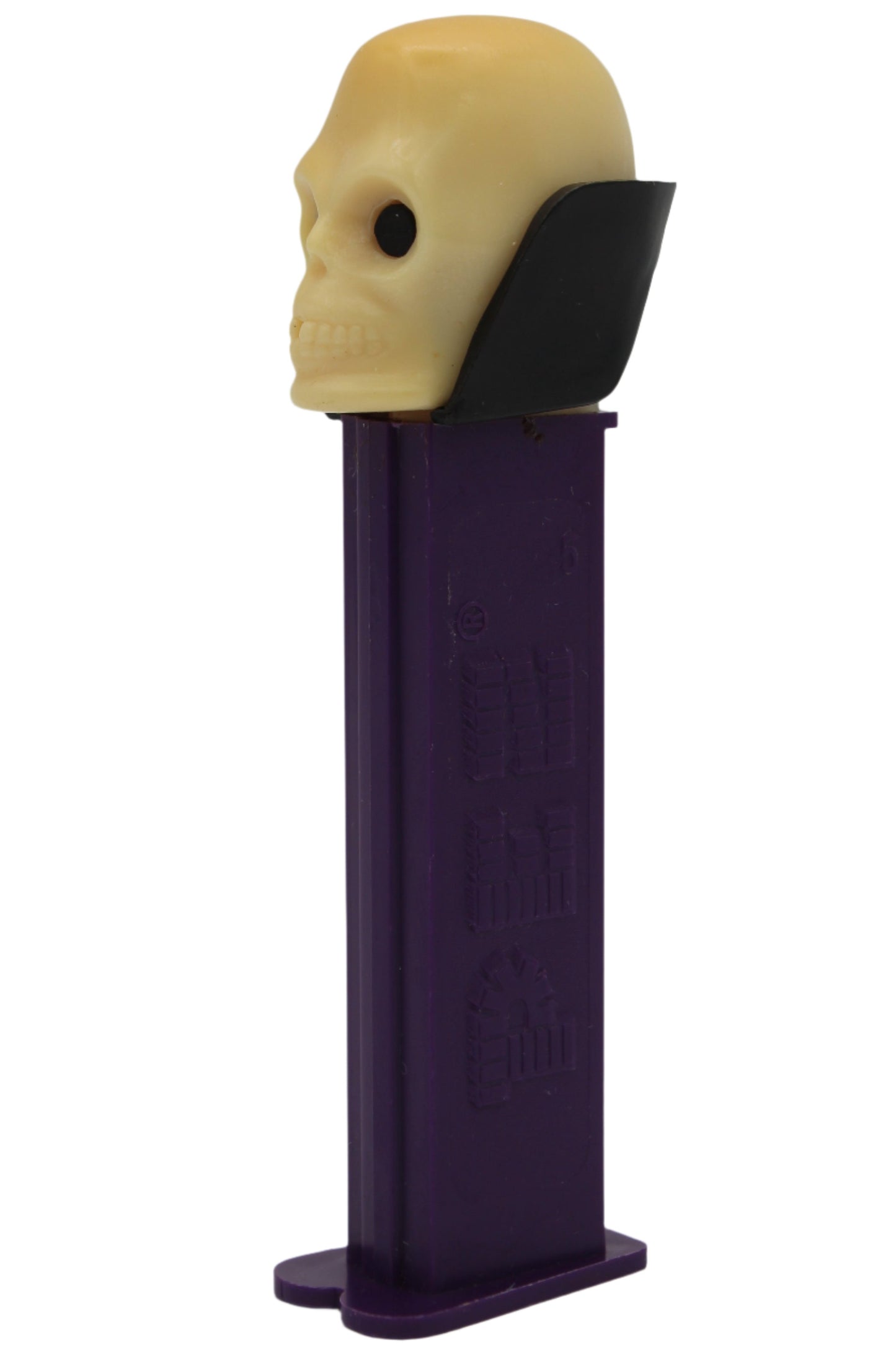 Dr Skull Pez, Skull B, Vampire Pez on Purple Stem, Yellowed Skull, 2002, Slovenia, Loose